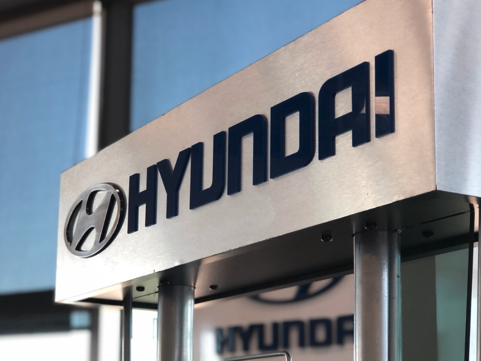 Close-up of the Hyundai dealership sign inside Crain Hyundai of Fort Smith, symbolizing trusted auto financing solutions in Arkansas.